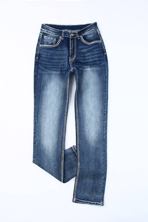 a pair of blue jeans on a white background
