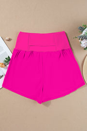 a pair of pink shorts sitting on top of a table
