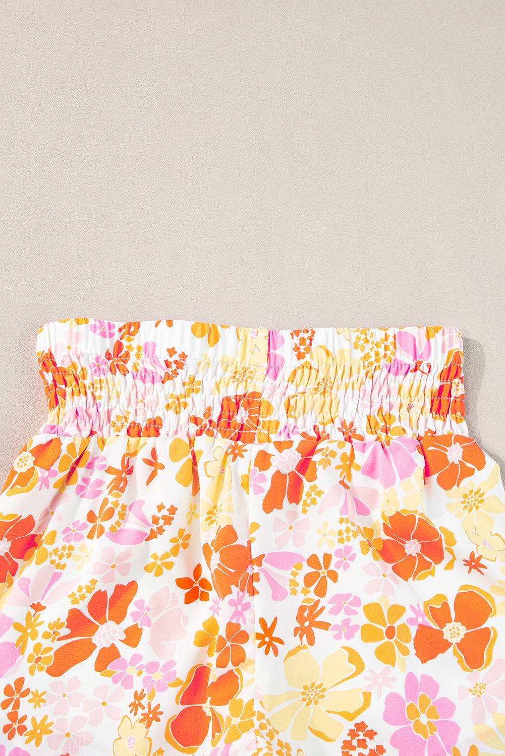 a close up of a skirt with flowers on it