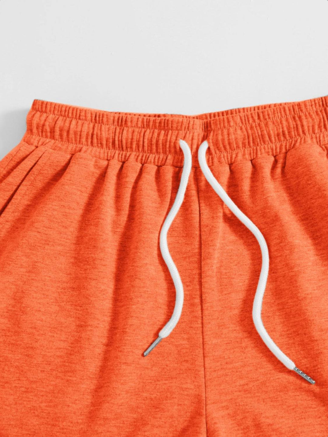 a close up of a pair of orange shorts