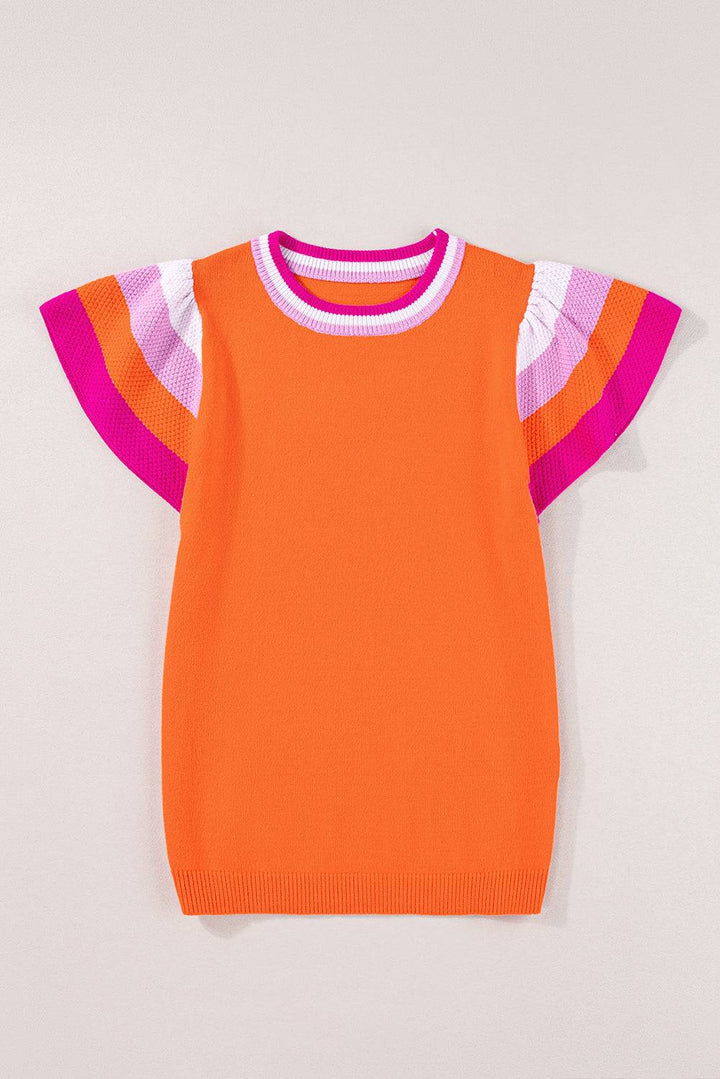 an orange sweater with pink and white stripes