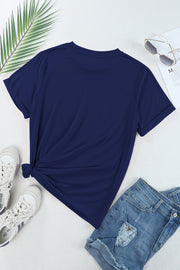 a t - shirt, shorts, and sneakers are laid out on a white surface