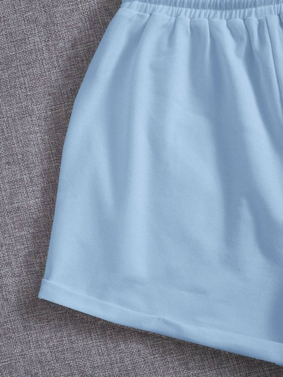 a close up of a light blue skirt