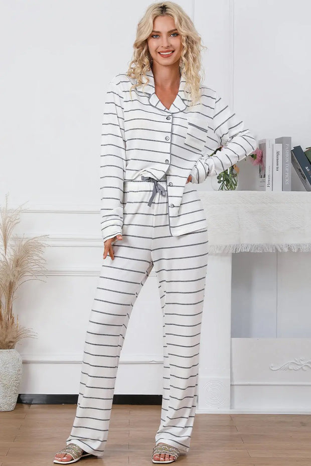 a woman wearing a striped pajama set