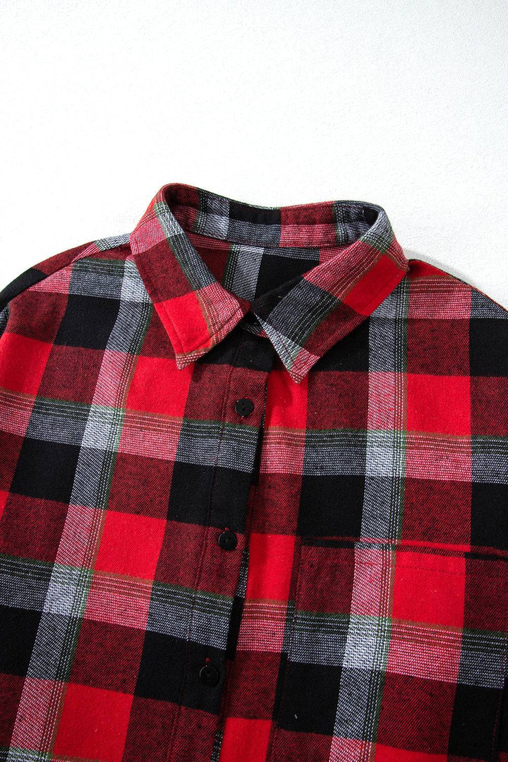 a red and black checkered shirt with a white background