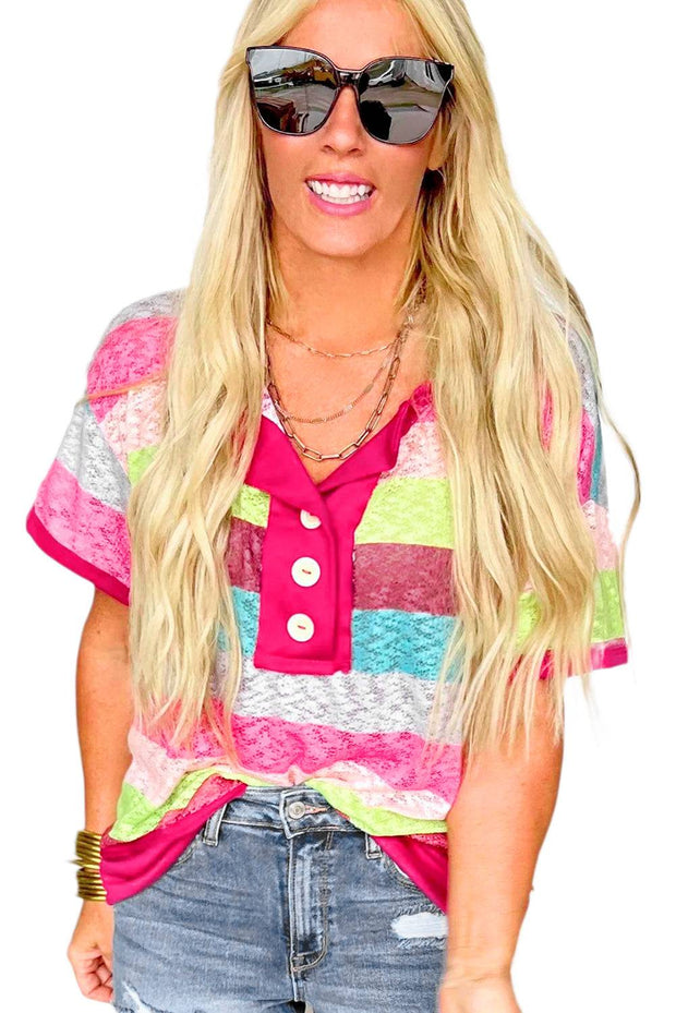 a woman wearing sunglasses and a colorful shirt