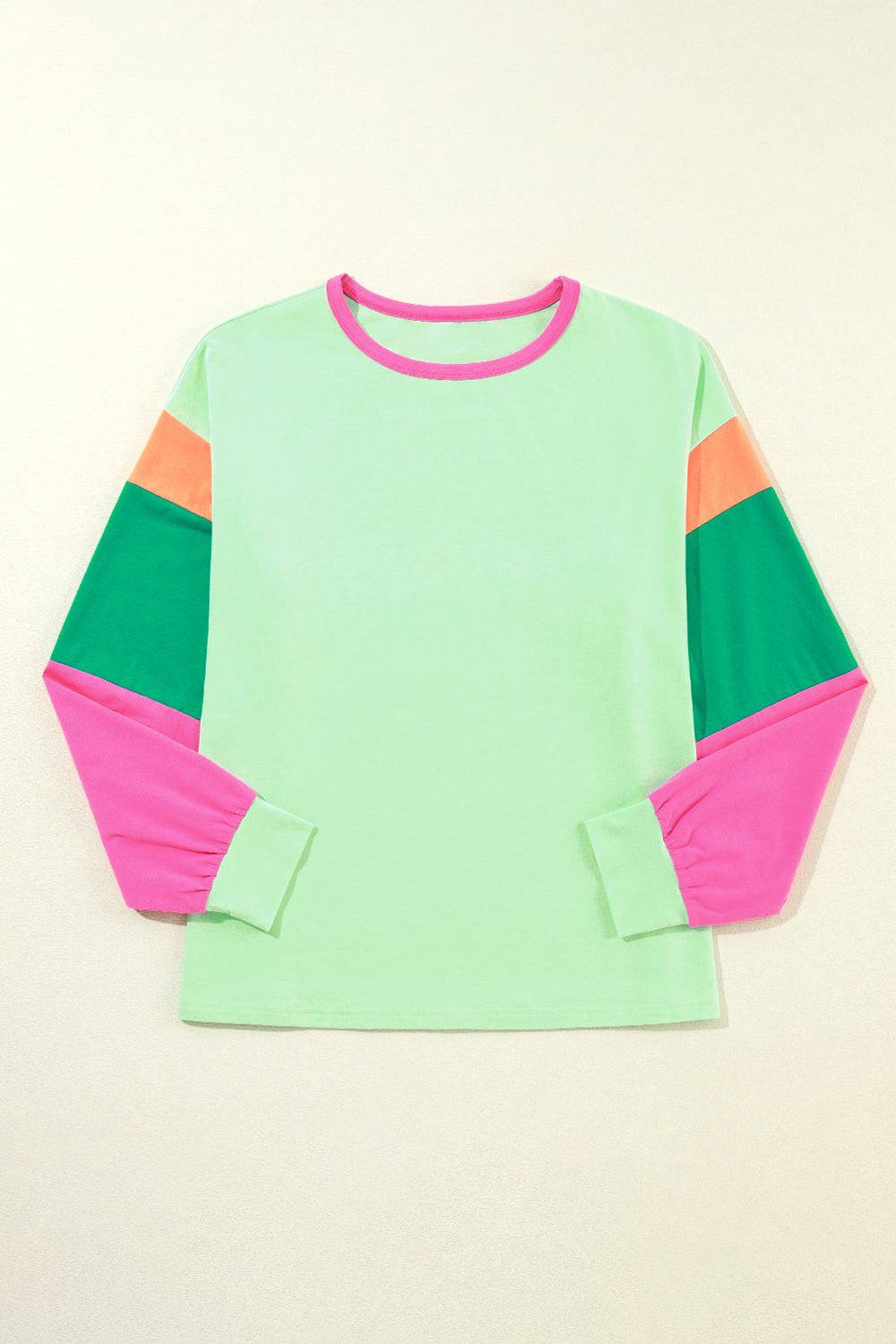 a green shirt with pink, green, and orange sleeves