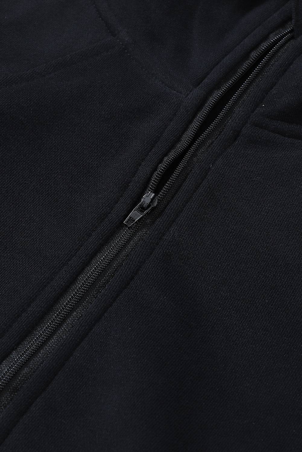 a close up of a zipper on a black jacket