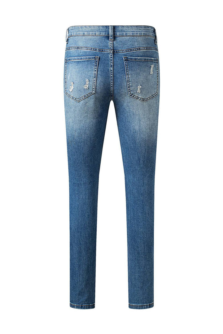 a pair of blue jeans with holes in the back