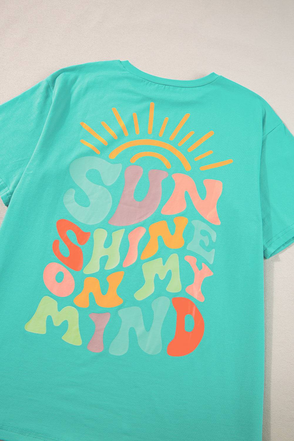 a t - shirt with the words sun shine on it