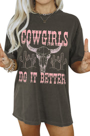 a woman wearing a cowgirls do it better t - shirt
