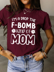 a woman wearing a t - shirt that says i'm a drop the f