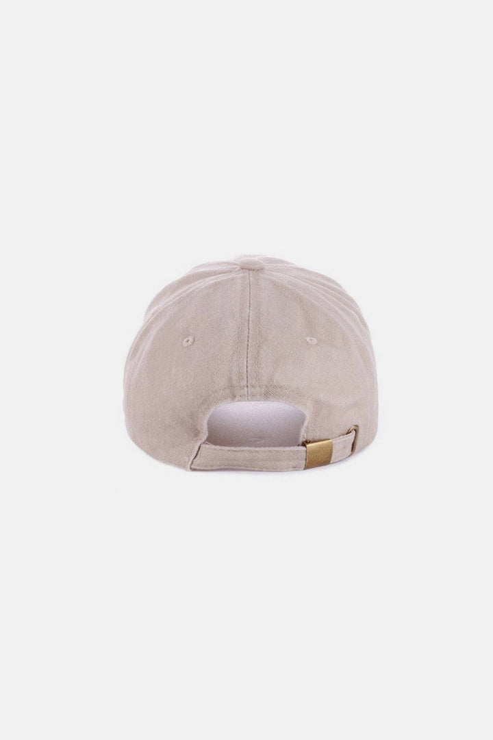 a baseball cap with a white visor on top of it