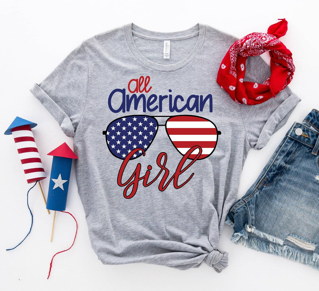 an american girl shirt with sunglasses and a bandana