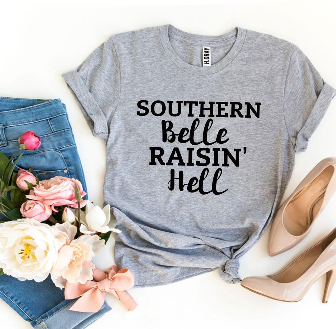 a t - shirt that says southern belle raisin'hell
