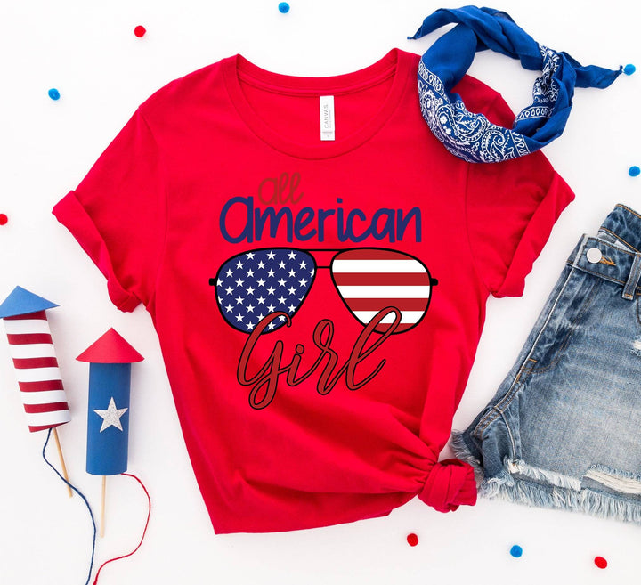 an american girl shirt with sunglasses and a scarf
