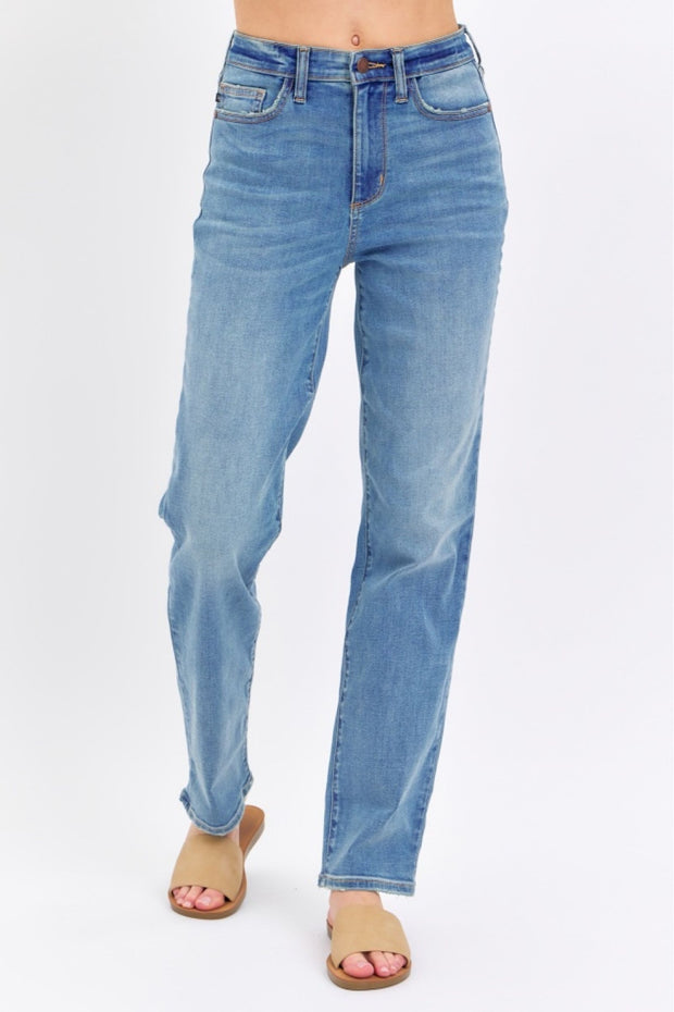 a woman is wearing a pair of blue jeans