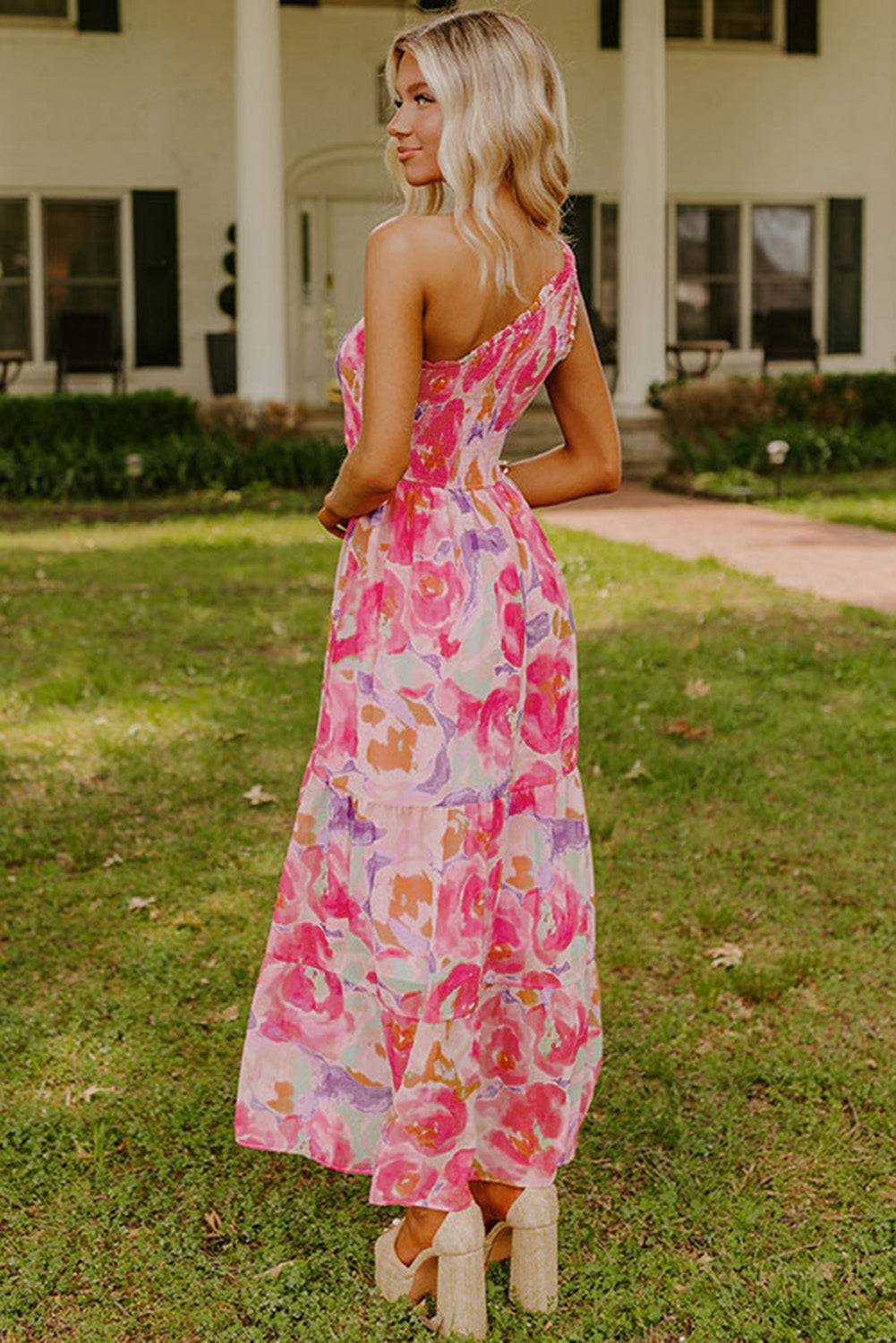 Back view of Pink Abstract Floral Print Shirred One Shoulder Maxi Dress, featuring flowy bohemian style and vibrant summer colors. Available at Faith & Co. Boutique.