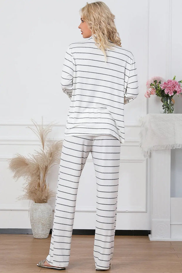 a woman wearing a white and black striped pajamas