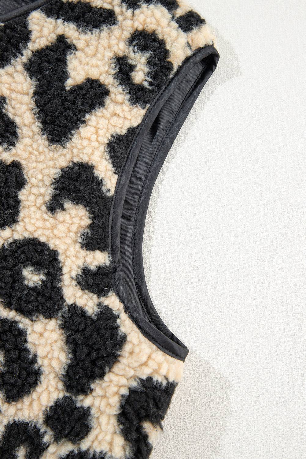 a close up of a black and white animal print sweater