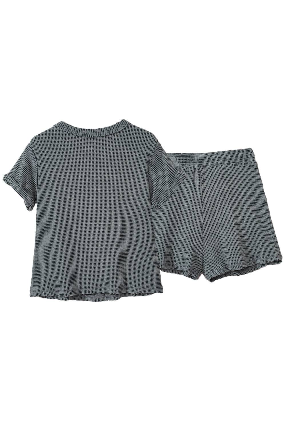 a baby girl's outfit with short sleeves and shorts