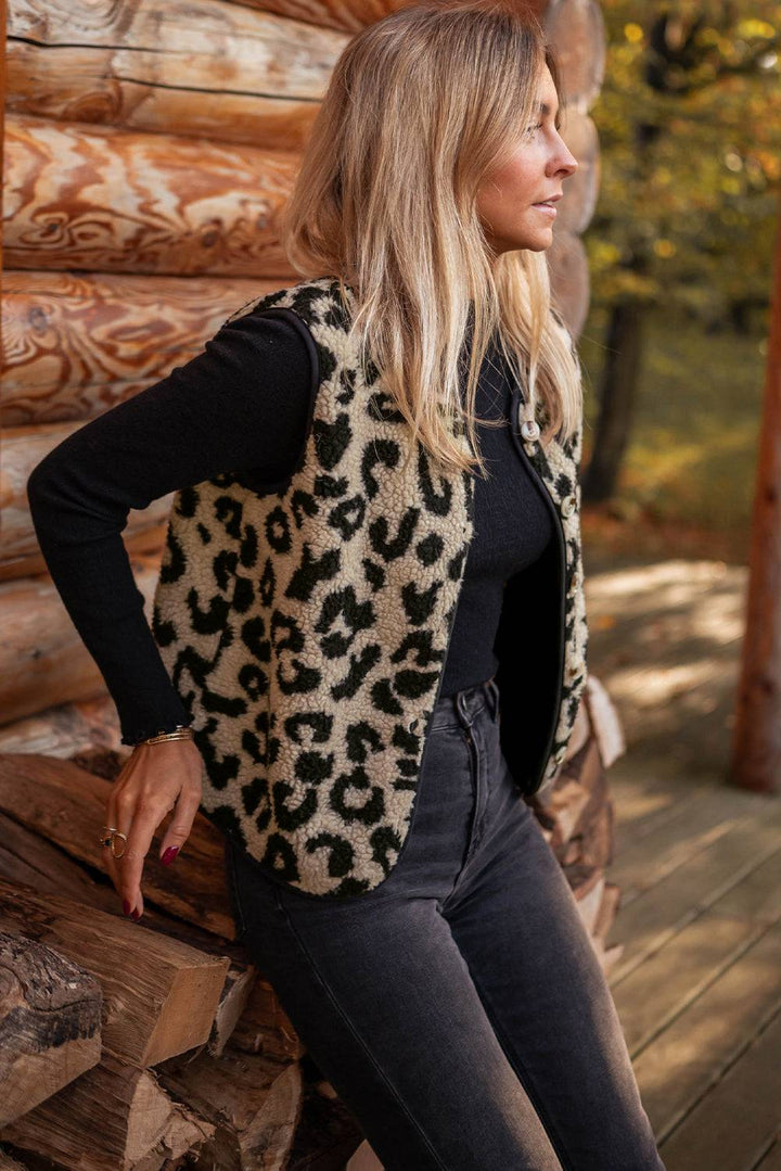 a woman standing next to a pile of logs