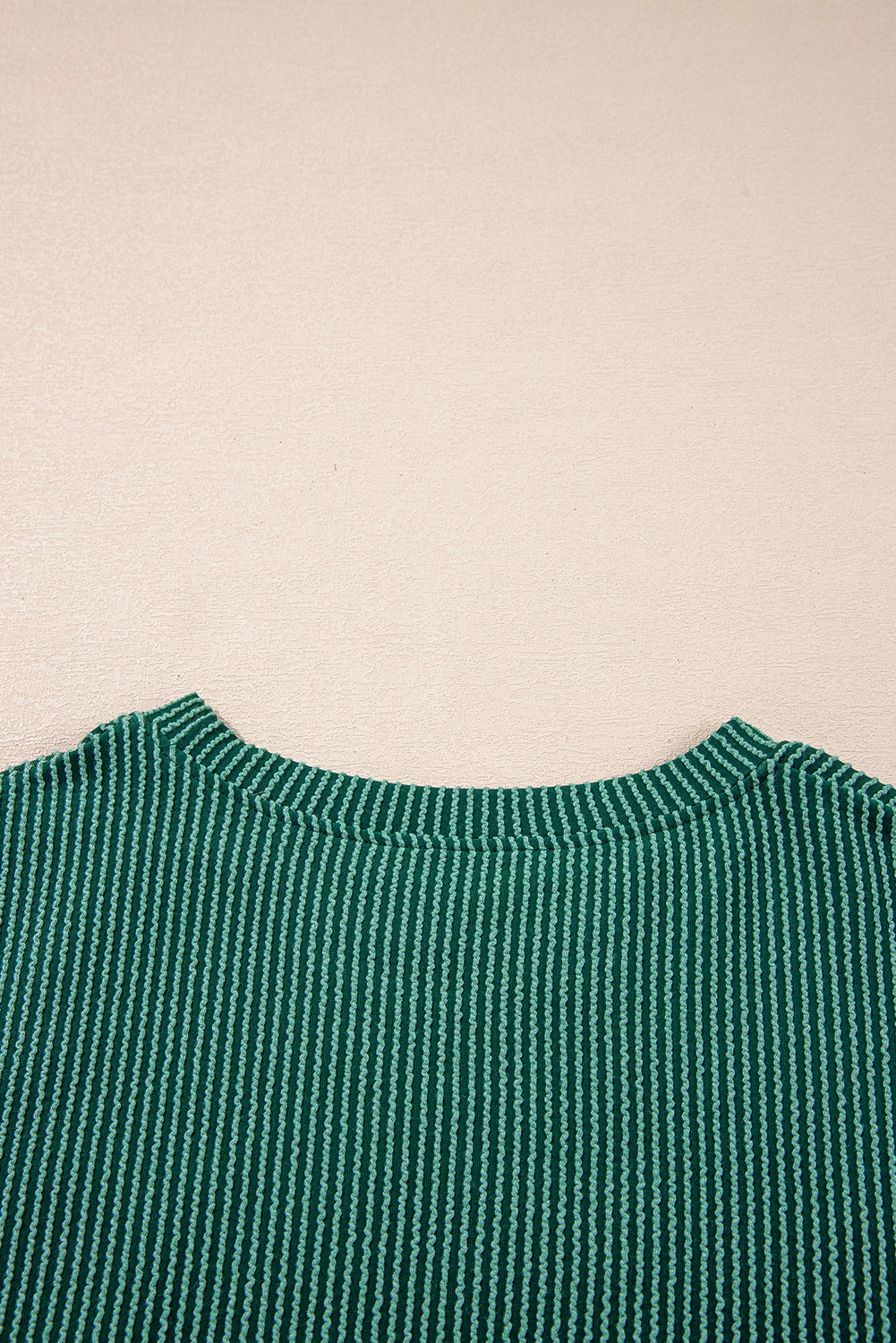 Back neckline detail of green Evergreen JOLLY Corded Top. Soft ribbed fabric for comfort from Faith & Co. Boutique.