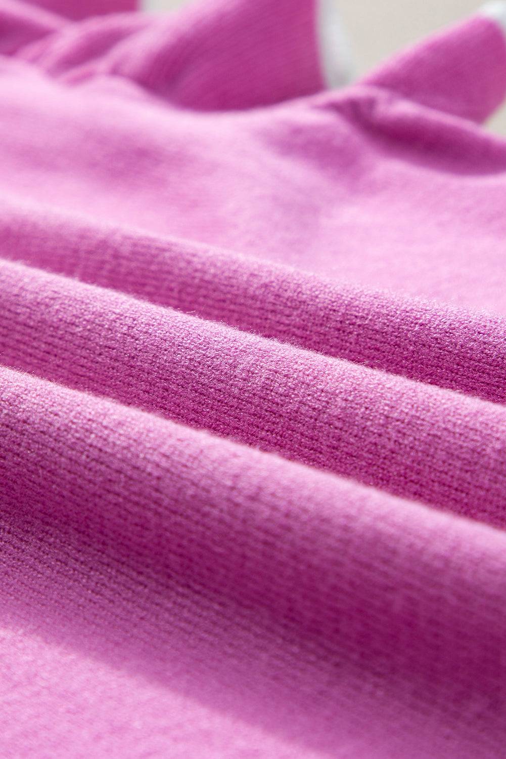 a close up view of a pink fabric