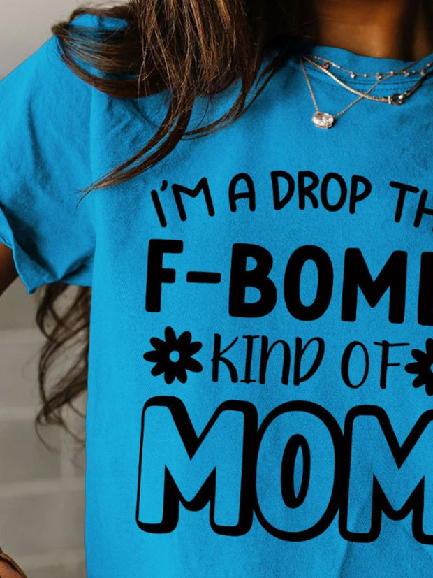 a woman wearing a t - shirt that says i'm a drop the f