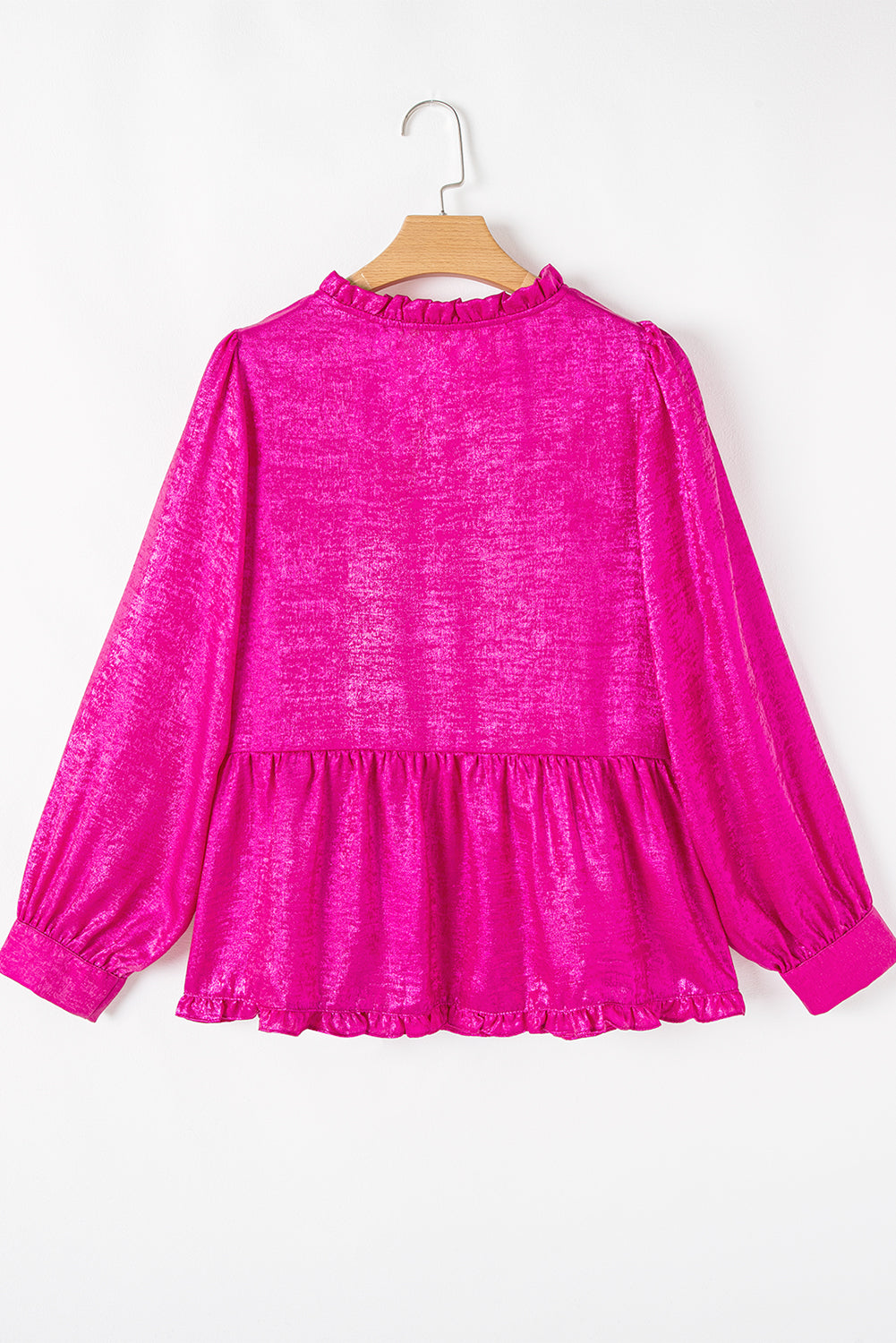 Back flat lay of Pink Metallic Frilled V Neck Puff Sleeve Babydoll Blouse, showcasing ruffle details and soft velvet texture.