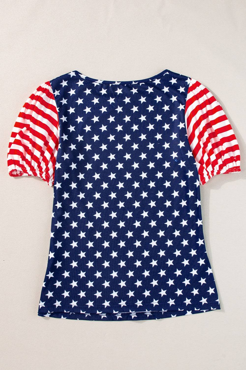 a red, white and blue top with stars on it
