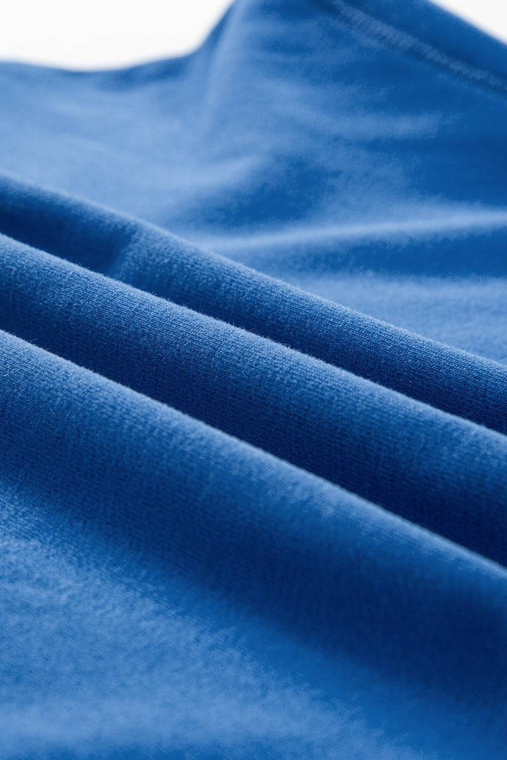 a close up view of a blue fabric