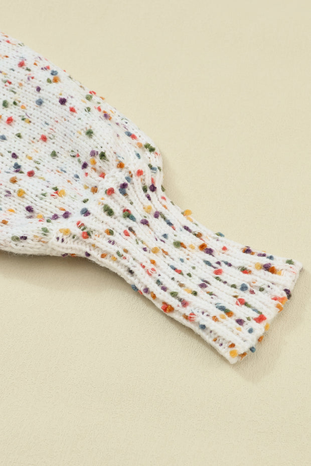a pair of white socks with multicolored dots on them