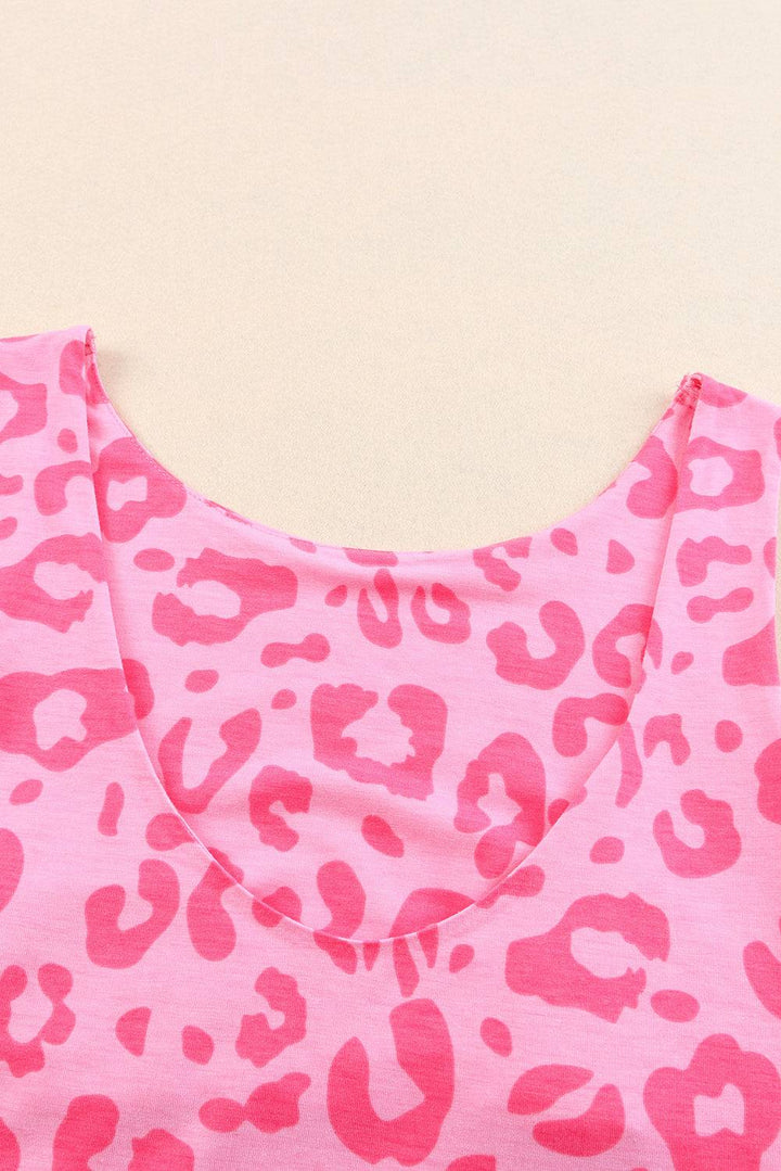 a pink top with a leopard print on it