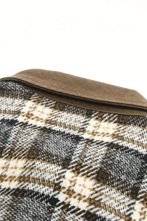 a close up of a brown and white plaid fabric