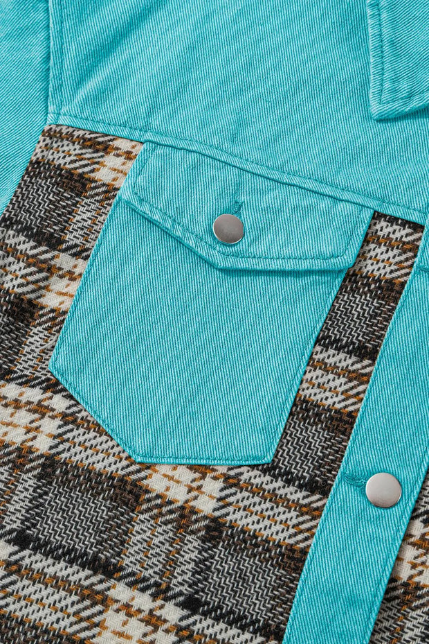 a close up of a blue shirt with a checkered pattern