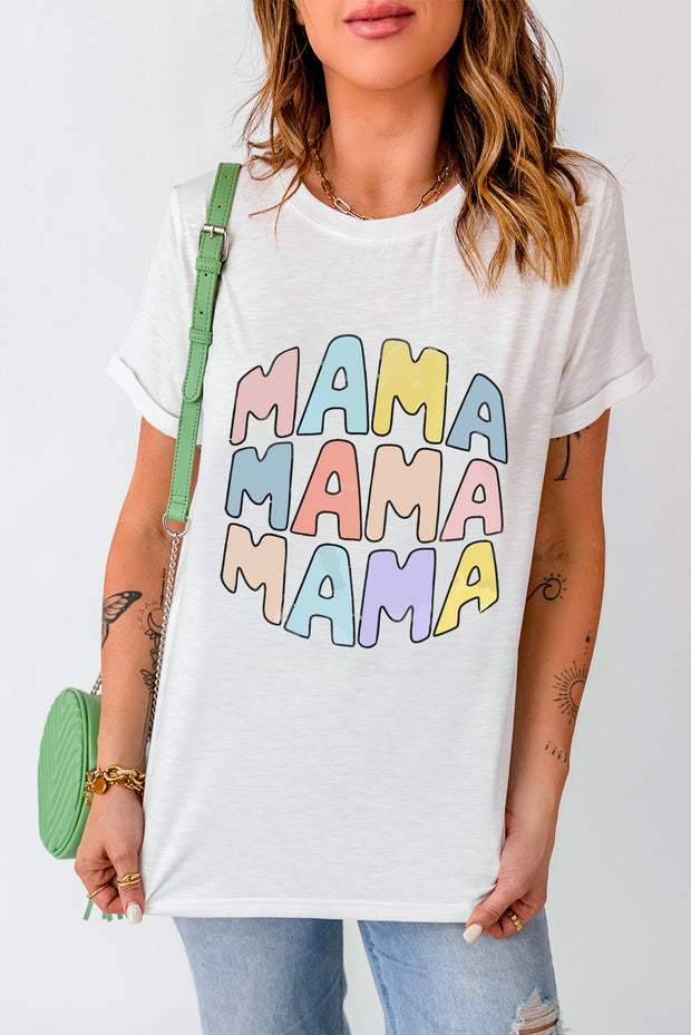 a woman wearing a white shirt with the words mama on it