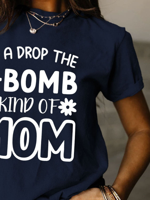a woman wearing a t - shirt that says i'm a drop the bomb