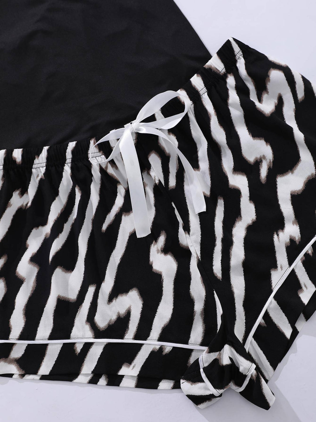 a pair of zebra print shorts tied together