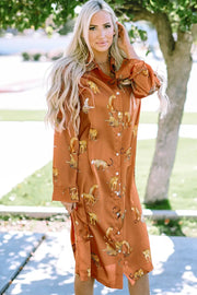 a woman wearing an orange shirt dress with cats on it