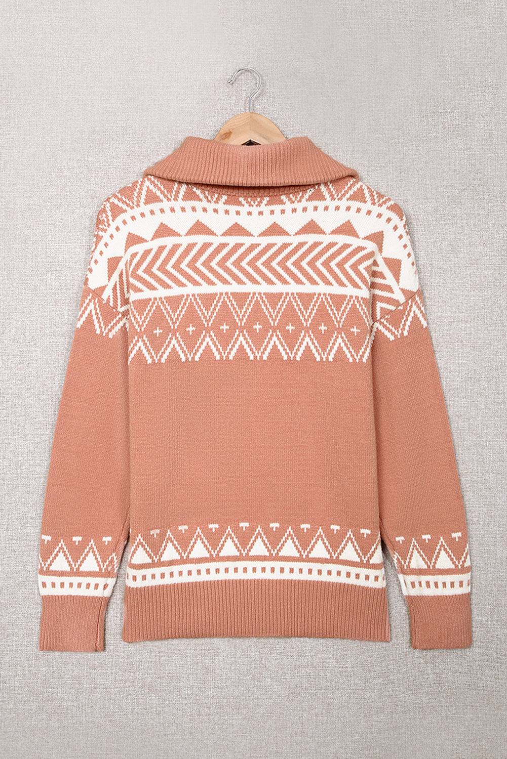 a brown sweater with a white pattern on it