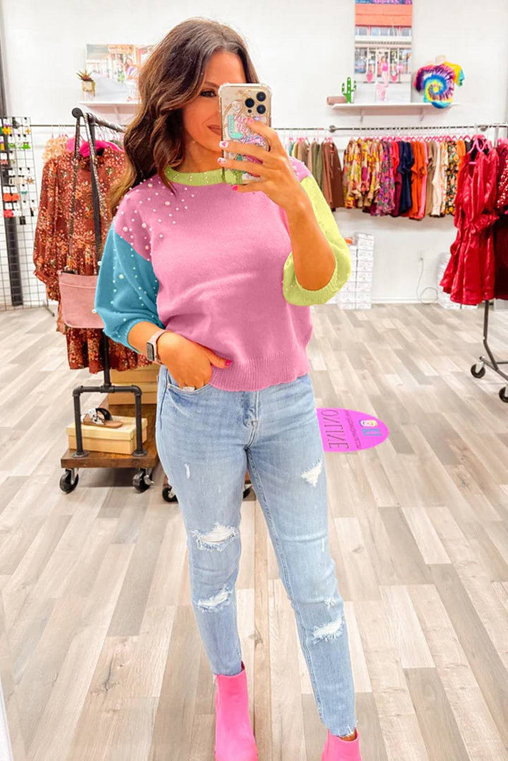 a woman taking a selfie in a clothing store