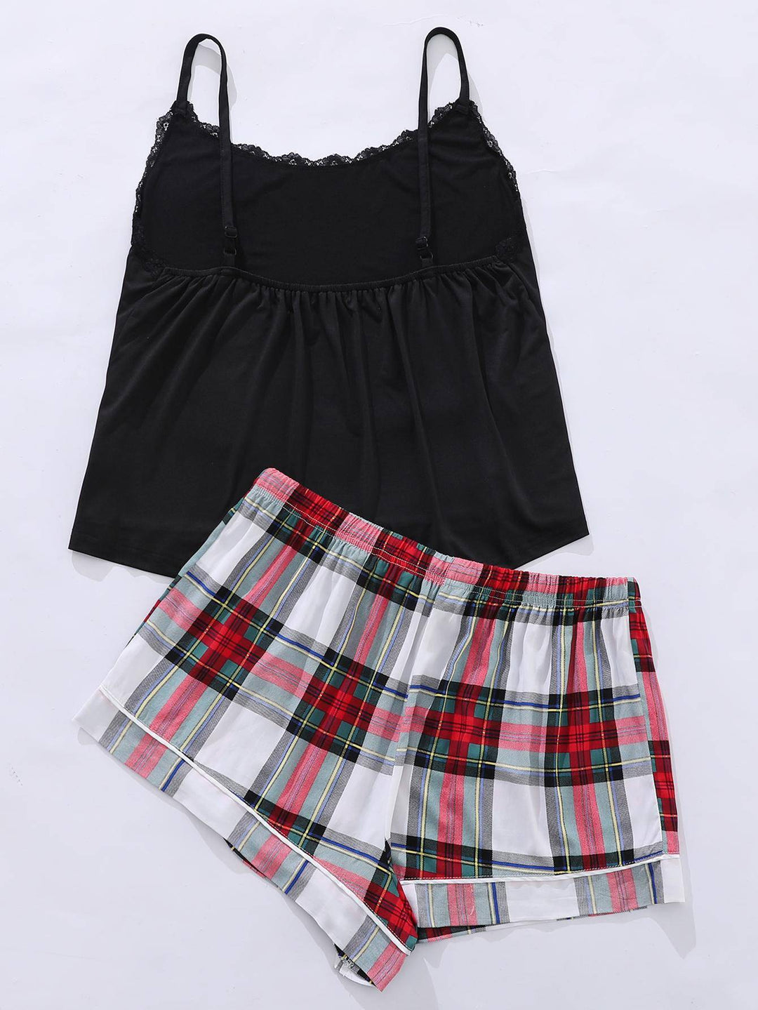 two women's plaid shorts and a black tank top