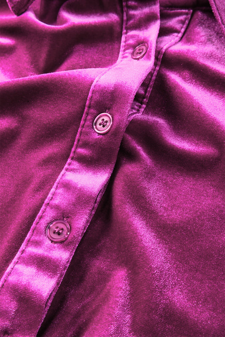 a close up of a purple shirt with buttons