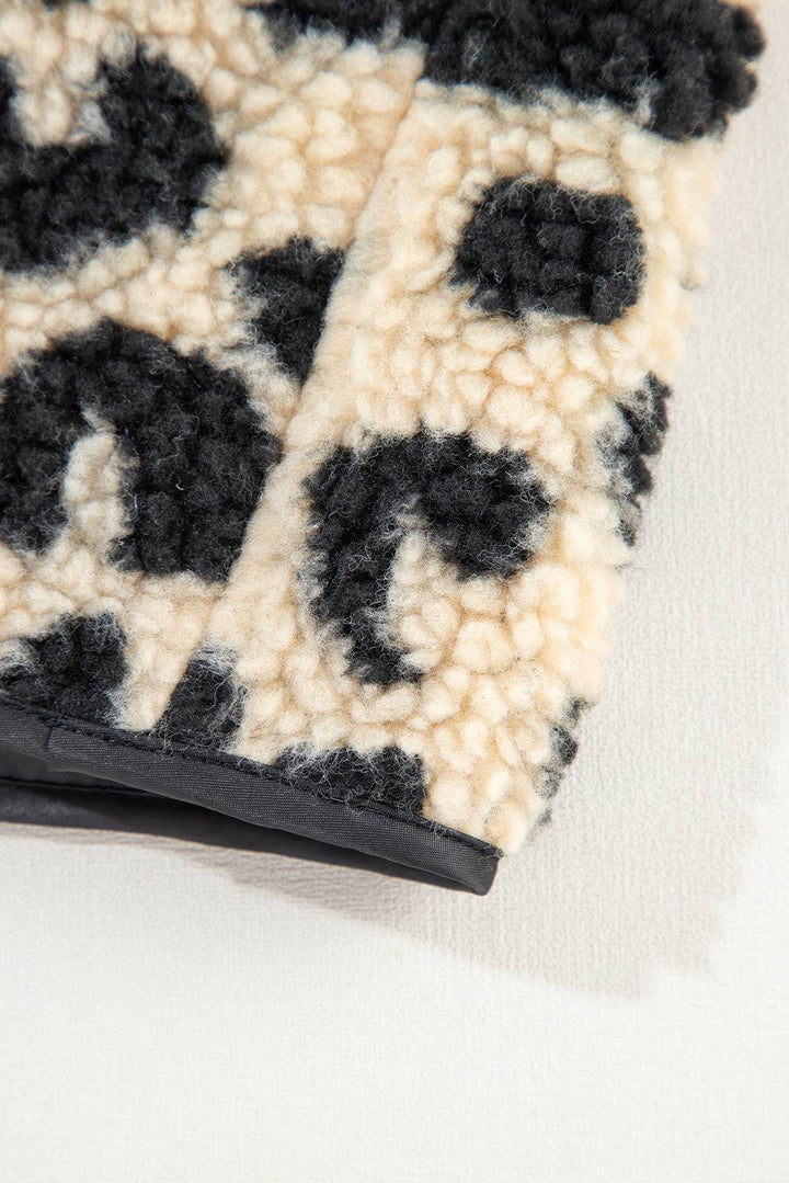 a close up of a rug on a white surface