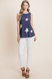 a woman wearing a tank top with stars on it
