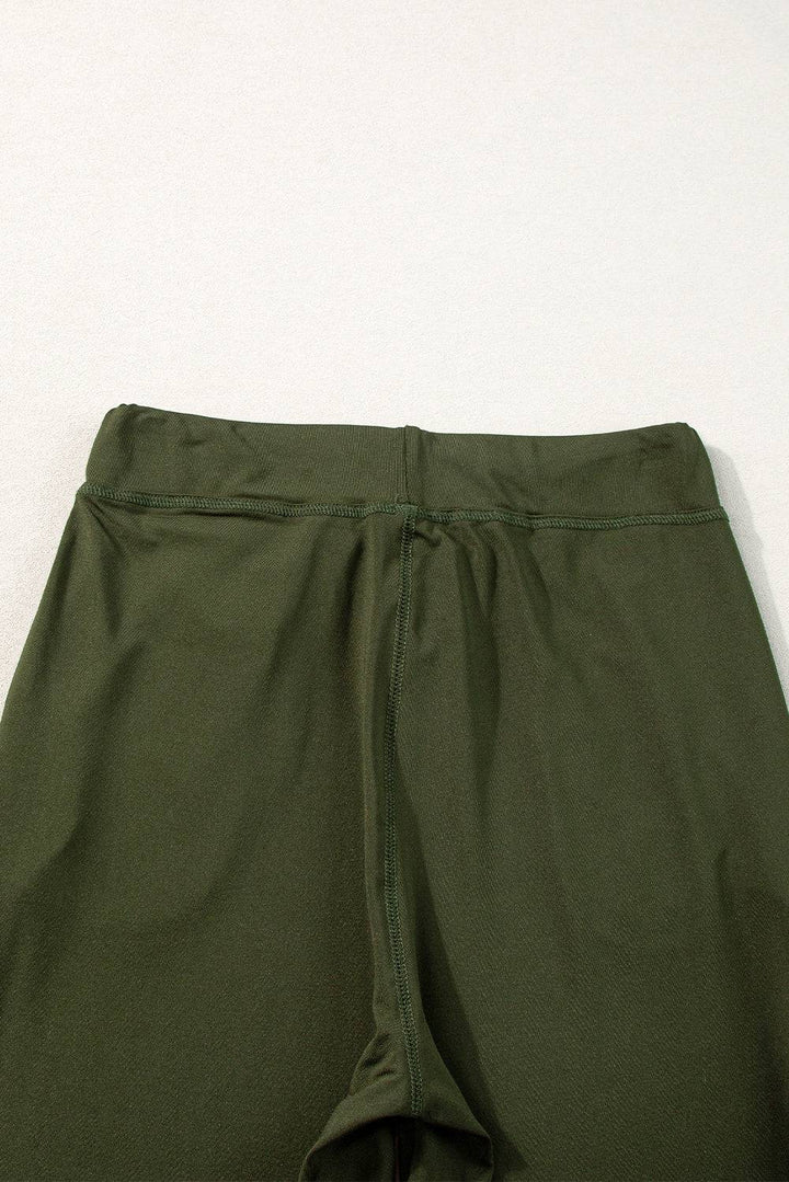 a close up of a pair of green pants