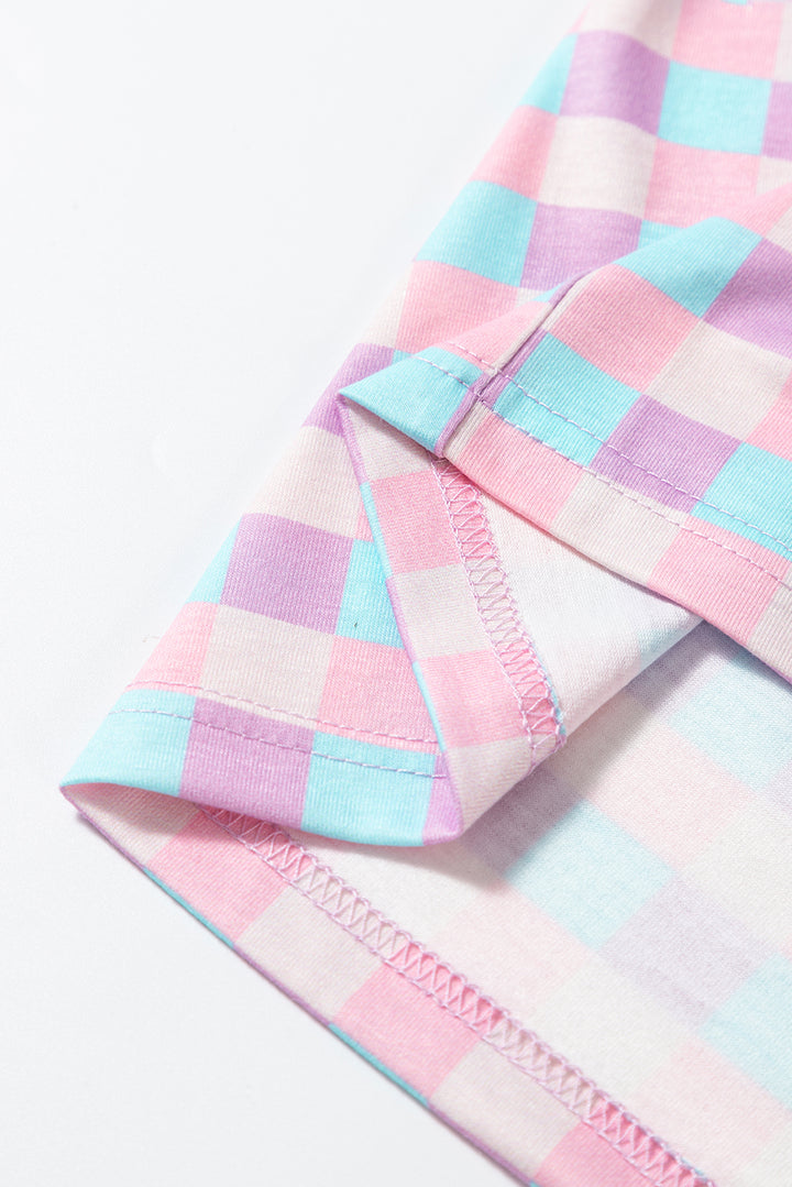 Detailed view of hem stitching on Purple Checkered Pattern Short Sleeve Pajamas Set, emphasizing quality craftsmanship and soft fabric.