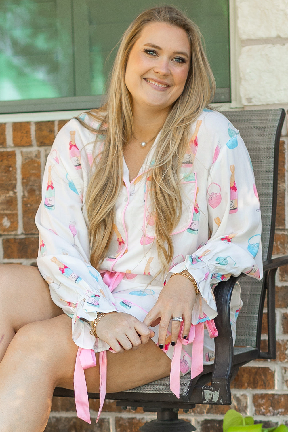 Relax in style with the White Plus Size Wine Glass Print Bow Knot Pajama Set from Faith & Co. Boutique, designed for comfort and charm.