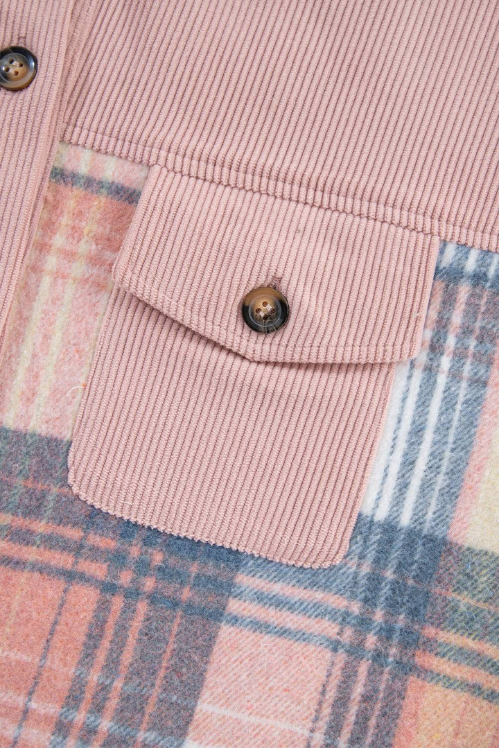 a close up of a pink shirt with a plaid pattern